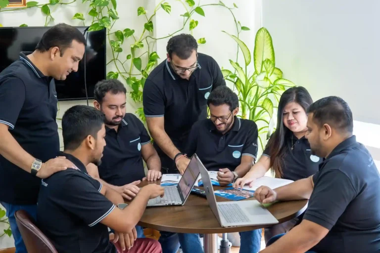 The Kloudac team collaborating on financial reports and digital solutions. Our accounting firm in Dubai uses modern technology to deliver efficient and accurate accounting services to our clients.
